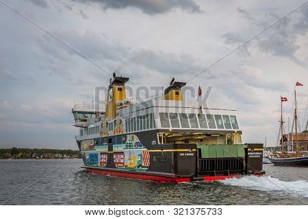 The Colourful Ferry To Aeroe Sailing Out Of The Port Of Svendborg, Denmark, July 10, 2019