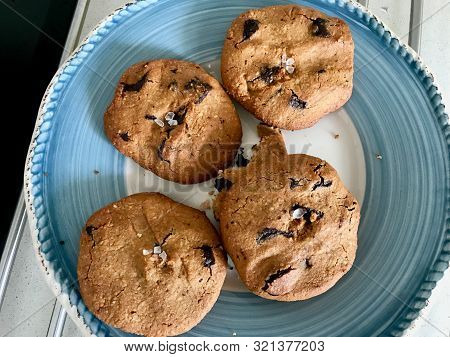 Paleo Chocolate Chip Cookies Made With Coconut, Almond Flour And Sea Salt In Plate.