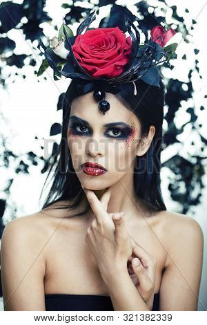Pretty Brunette Woman With Rose Jewelry, Black And Red, Bright Make Up Kike A Vampire Closeup Red Li