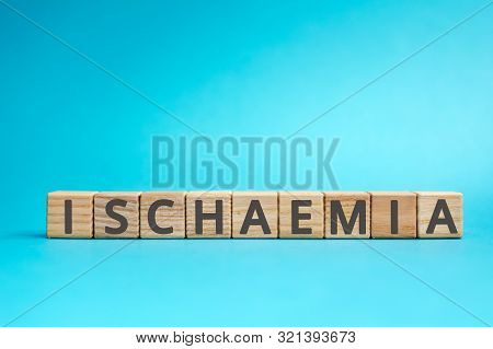 Ischaemia Inscription Wooden Cubes With Letters On A Blue Background