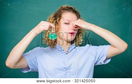 Chemical Liquid Smelling Really Bad. Disgusting Experiment. Girl Student Dislike Chemistry. Student 