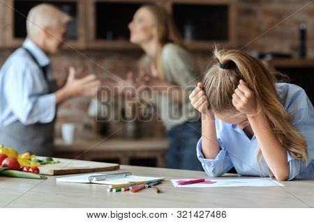 Generation Gap Concept. Upset Girl Crying While Her Mom And Granny Fighting At Kitchen, Free Space