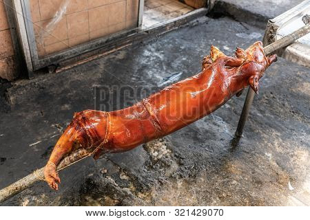 Manila, Philippines - March 5, 2019: Calavite Street In Salvacion Part Of Town. Closeup Of Red-brown