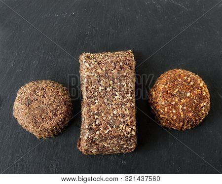 Top View Of Three Bars Of Homemade Beef Meat And Liver Pemmican, Plain With Salt, With Hemp Seeds An