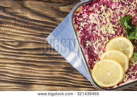 Herring Under Fur Coat. Traditional Russian Salad Herring Under A Fur Coat, Vintage Wood Background.