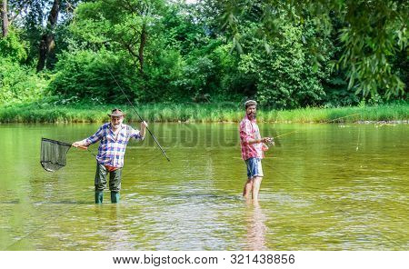 Activity And Hobby. Fishing Freshwater Lake Pond River. Bearded Men Catching Fish. Master Baiter. Ma