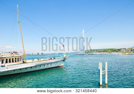 Geneva, Switzerland - July 17, 2019: Jet Deau, A Famous Water Fountain On Geneva Lake. Symbol Of The