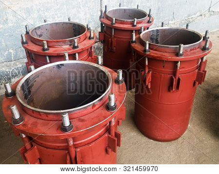 Red Gland Expansion Joints For Heating Main.