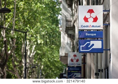 Lyon, France - July 13, 2019: Credit Mutuel Logo In Front Of Their Local Bank In Lyon. Credit Mutuel