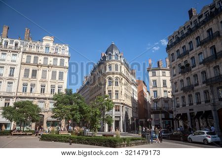 Lyon, France - July 13, 2019: Pedestrians Walking On Place Des Jacobins In Lyon, France, Facing A Ha