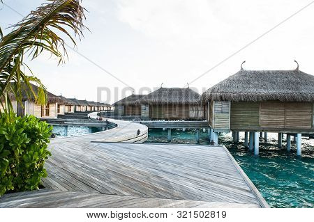 Water Villas In The Maldives In The Sun