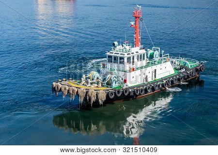 The Small Tug Vessel In The Sea