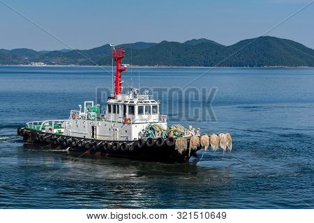The Small Tug Vessel In The Sea