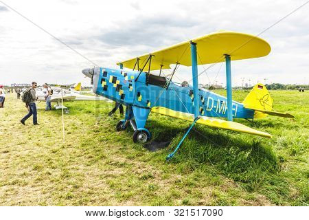 KALININGRAD, Russia - August 18, 2019: 100 Anniversary First European Airport Devau Fest, Ultra Light Propeller Screw Plane Ready for Flight