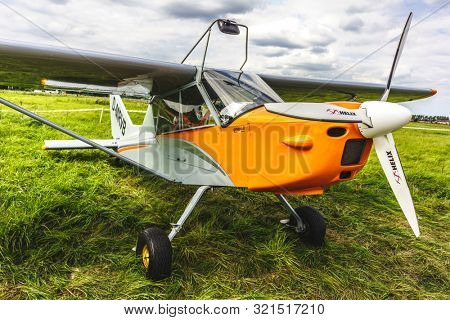 KALININGRAD, Russia - August 18, 2019: 100 Anniversary First European Airport Devau Fest, Ultra Light Propeller Screw Plane Ready for Flight