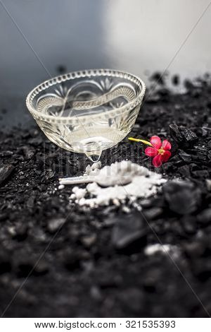 Activated Charcoal Well Mixed With Baking Soda To Detoxify Strands And Scalp, Restore Shine, Repair
