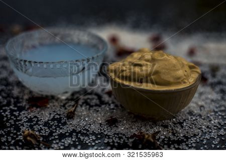 Ubtan/face Mask/face Pack Of Multani Mitti Or Fuller's Earth On Wooden Surface In A Glass Bowl Consi