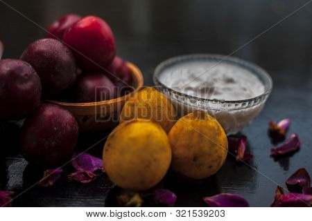 Healthy Face Mask Of Plum Or Aloo Bukhara In A Glass Bowl On The Wooden Surface Consisting Of Plum E