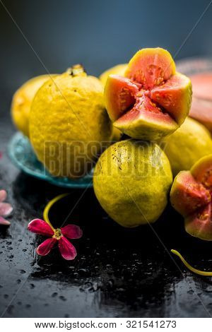 Skin Whitening Remedy/treatment On The Black Shiny Surface Consisting Of Guava Pulp And Honey. Also