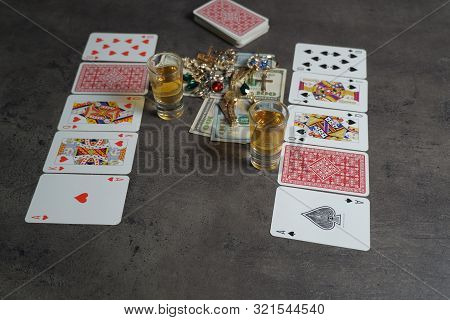 9 09 2019 Tallinn, Estonia: The Combination Of Flash Royal Cards On A Gray Table With Money And Gold