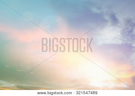 Natural Background Blurring Warm Colors And Bright Sun Light. Bokeh Or Christmas Background Green En