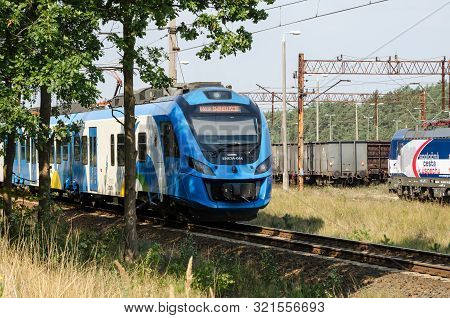 Swinoujscie, West Pomeranian / Poland - 2019: Modern Electric Multiple Unit On The Raiway Route