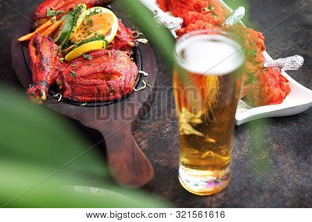 Indian Beer. Traditional Indian Beer And Traditional Oriental Dishes. Indian Restaurant
