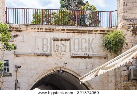 Jerusalem, Israel, September 07, 2019 : Coat Of Arms On The Wall On Muristan Street In The Old City 