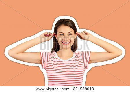 Funny-looking Woman Grimacing Making Ears Protruding. Emotional Girl Magazine Collage Style With Tre