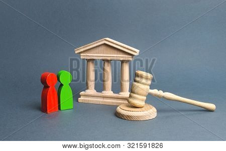 Two Figures Of People Opponents Stand Near The Courthouse And The Judge's Gavel. Conflict Resolution