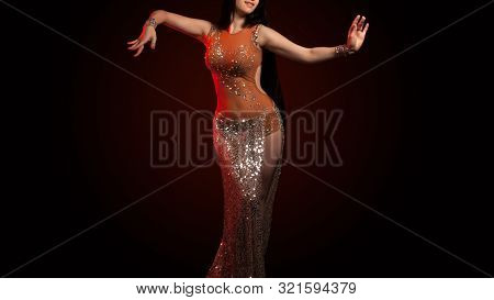 The Body Of A Beautiful Girl In A Bead Costume For Belly Dance On A Black Background. Sexy Woman Dan