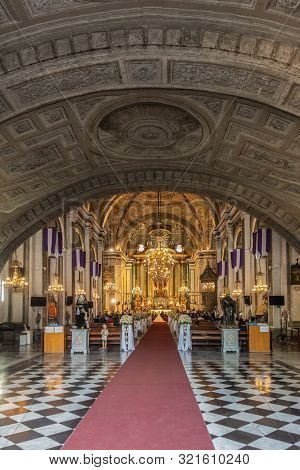 Manila, Philippines - March 5, 2019: San Augustin Church. Shot From Entrance: Hall Under Bowing Ceil