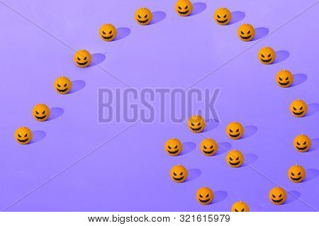 Halloween Orange And Violet Seamless Pattern. Orange Candle Pumpkins. Jack Olantern. Many Orange Pum