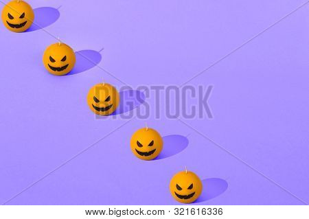 Halloween Orange And Violet Seamless Pattern. Orange Candle Pumpkins. Jack Olantern. Many Orange Pum