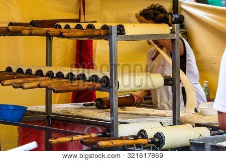 Preparation Of The Famous, Traditional And Delicious Hungarian Chimney Cake Kurtos Kolacs (kürtőskal