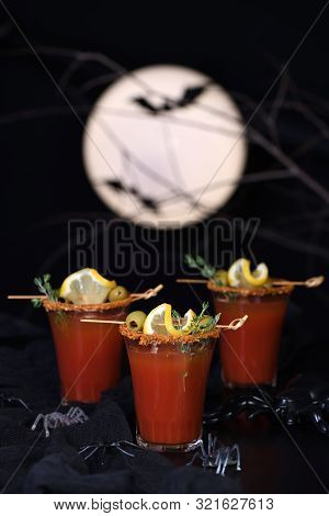 Michelada - Mexican Alcoholic Cocktail, Tomato Juice, Spicy Sauce And Spices. Great Idea For A Hallo