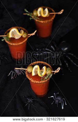Michelada - Mexican Alcoholic Cocktail, Tomato Juice, Spicy Sauce And Spices. Great Idea For A Hallo