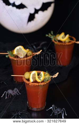 Michelada - Mexican Alcoholic Cocktail, Tomato Juice, Spicy Sauce And Spices. Great Idea For A Hallo