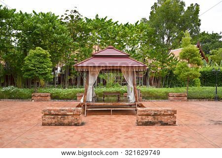 Kanchanaburi, Thailand, 09.09.2019: Beautiful Garden, Lake, Traditional Thai, Siamese Clothes, Build