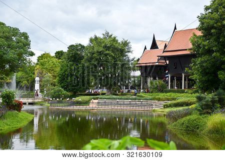 Kanchanaburi, Thailand, 09.09.2019: Beautiful Garden, Lake, Traditional Thai, Siamese Clothes, Build
