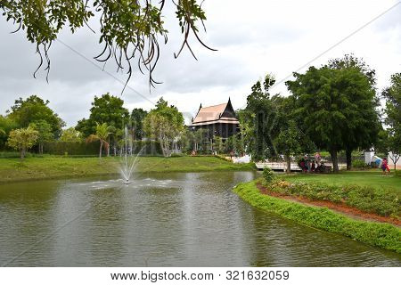 Kanchanaburi, Thailand, 09.09.2019: Beautiful Garden, Lake, Traditional Thai, Siamese Clothes, Build