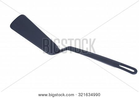 Plastic Kitchen Spatula For The Pan. Photo