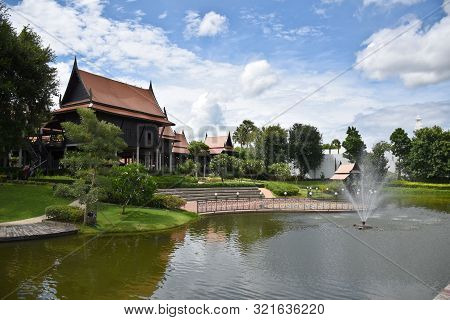 Kanchanaburi, Thailand, 09.09.2019: Beautiful Garden, Lake, Traditional Thai, Siamese Clothes, Build