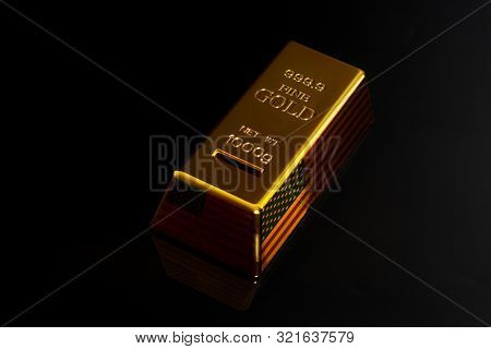 Gold Bar With Usa Flag On Black Background.