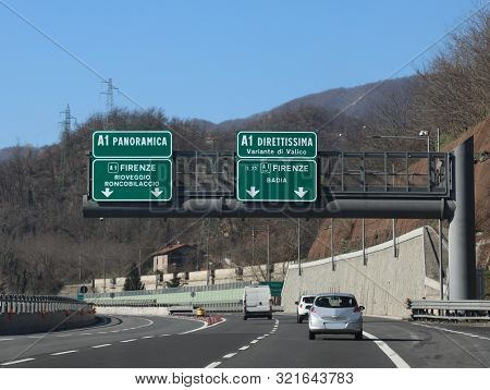 Italian Highway Junction With Text Of Street Names And Cities With Car