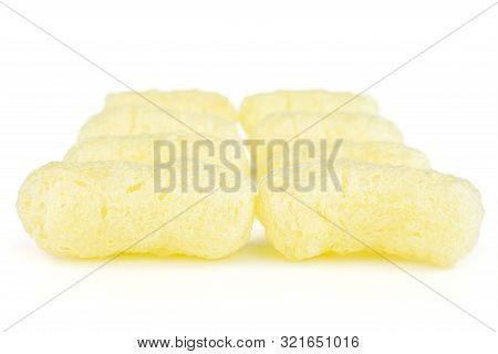 Group Of Eight Whole Salted Yellow Corn Puff Isolated On White Background