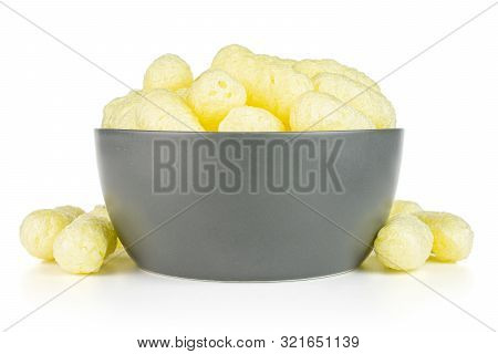 Lot Of Whole Salted Yellow Corn Puff In Gray Ceramic Bowl Isolated On White Background