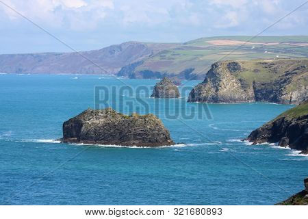A photography of a rough coast in cornwall