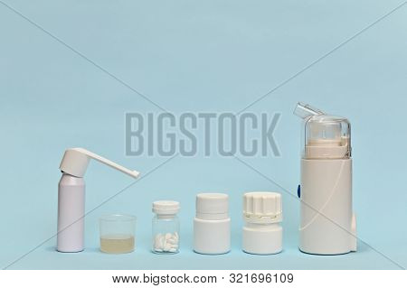 Train, Built Of Drugs And A Compact Imobulizer. At The End Is An Aerosol Bottle With A Drooping Nozz