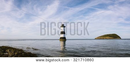 Seascape View From Penmon Point Anglesey North Wales With The Trwyn Du Lighthouse Built Between 1835